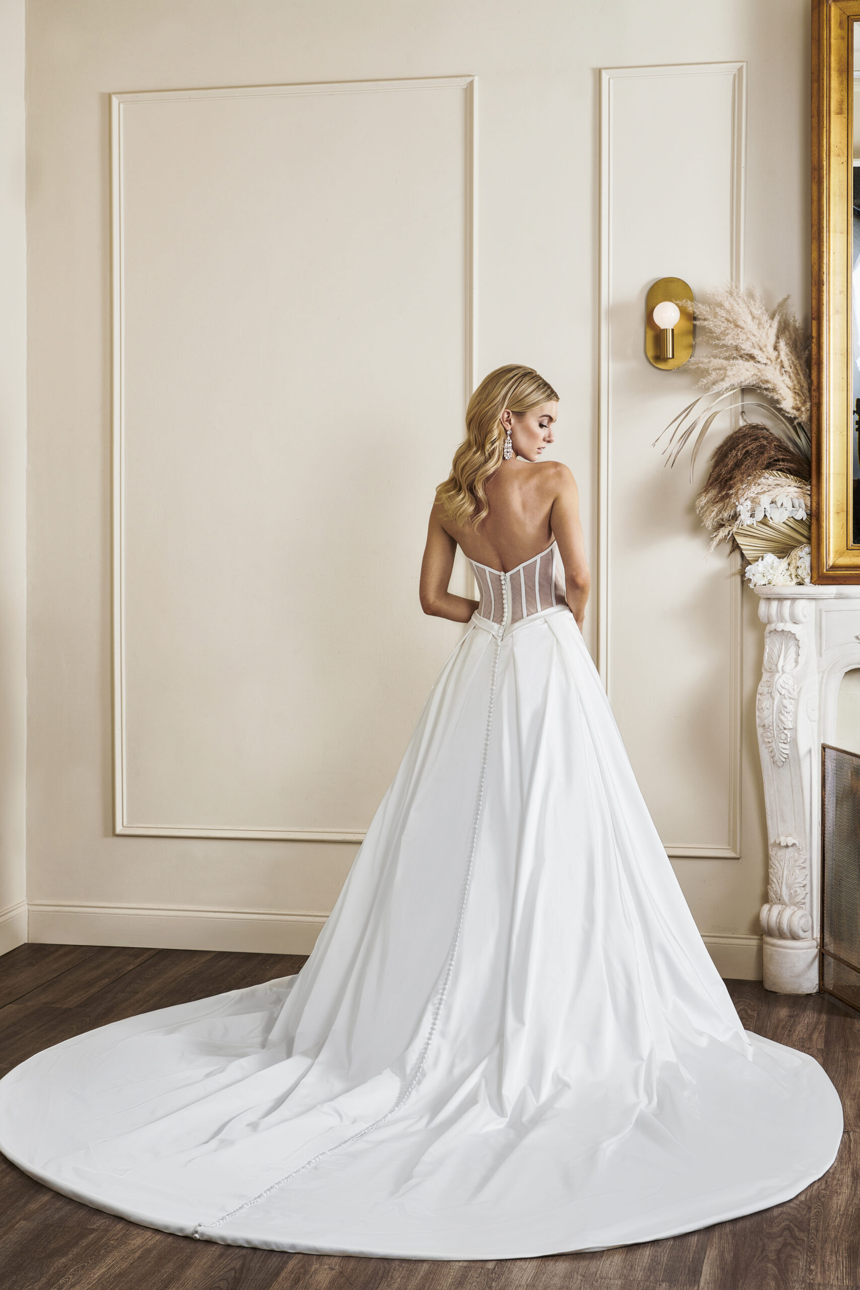 Sleek and Strapless Fit-and-Flare Gown with Box Pleats